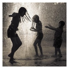kids playing in sprinklers